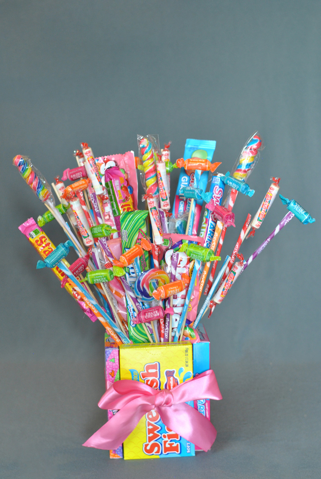 Candy box and candy sticks bouquet
