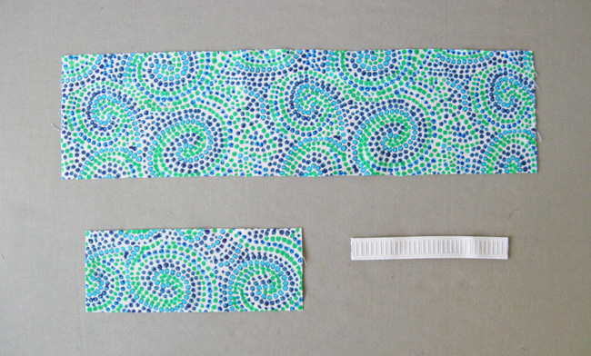 cut pieces of fabric and elastic