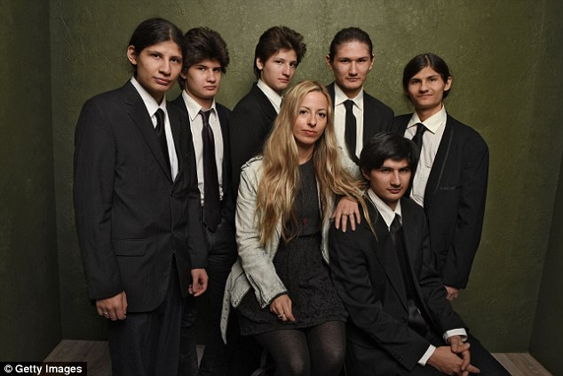 The Wolfpack: Director Crystal Moselle (center) with Mukunda, Govinda, Bhagavan, Narayana, Jagadisa  and Krisna Angulo from The Wolfpack, pictured last month at Sundance Film Festival