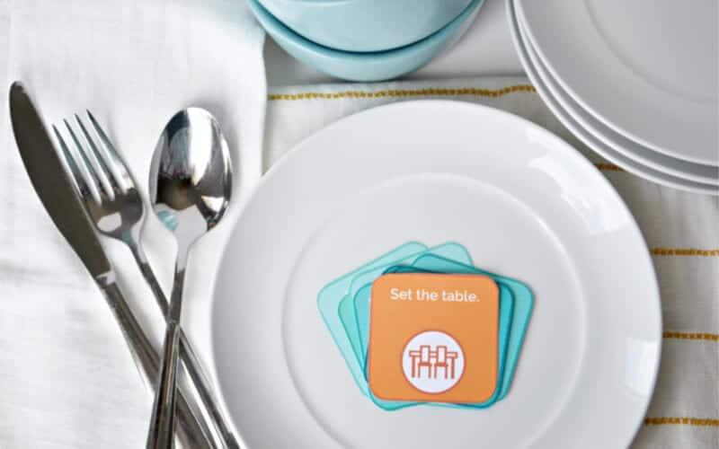 printable chore cards on a plate